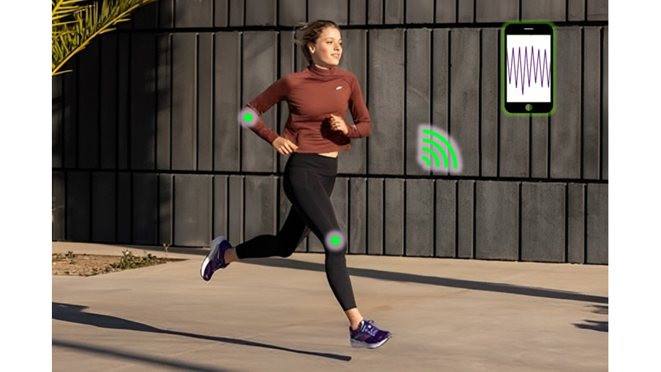 Runner with wireless gait tracking on smartphone.